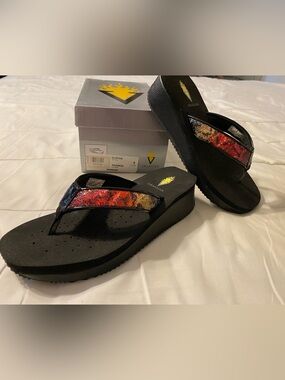 Volatile Black Platform Flip Flops with Red-Orange-Yellow Sequin Strap